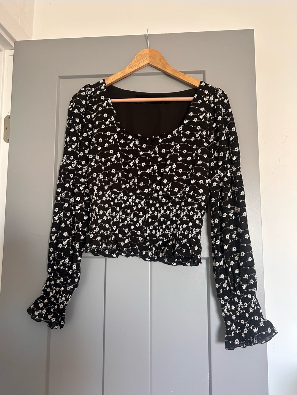 Black Floral Scoop-Neck Ruffle-Hem Blouse